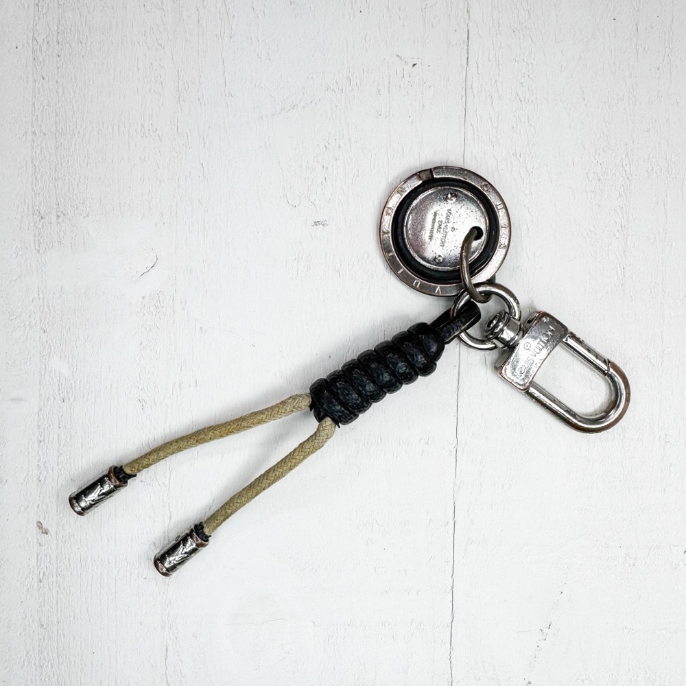Louis Vuitton LV Logo Keychain Bag Charm Rope Tassel Key Holder Silver Tone